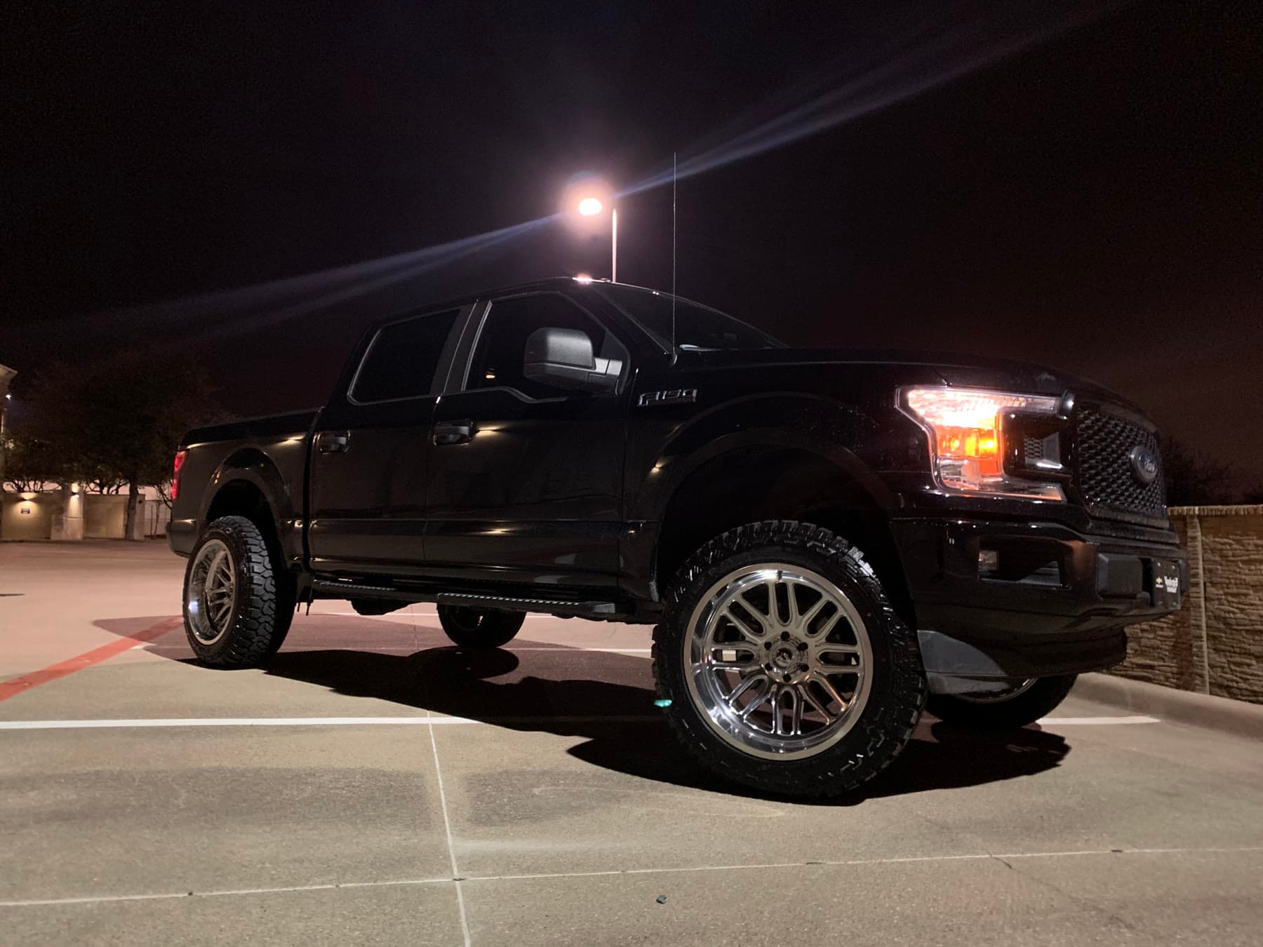 Completed black Ford F-150 exterior and stance