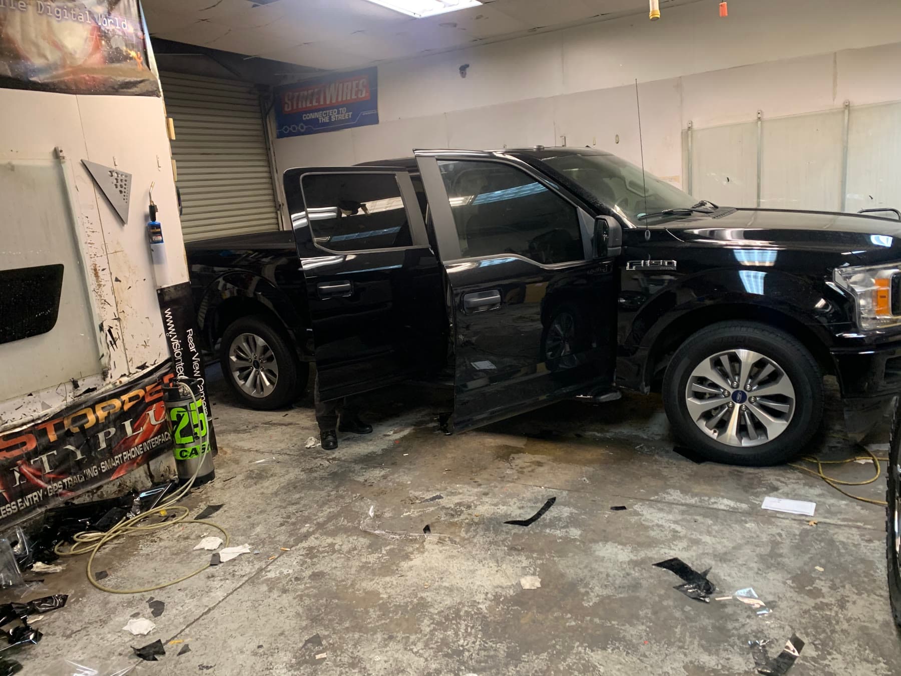 Black Ford F-150 during upgrade work